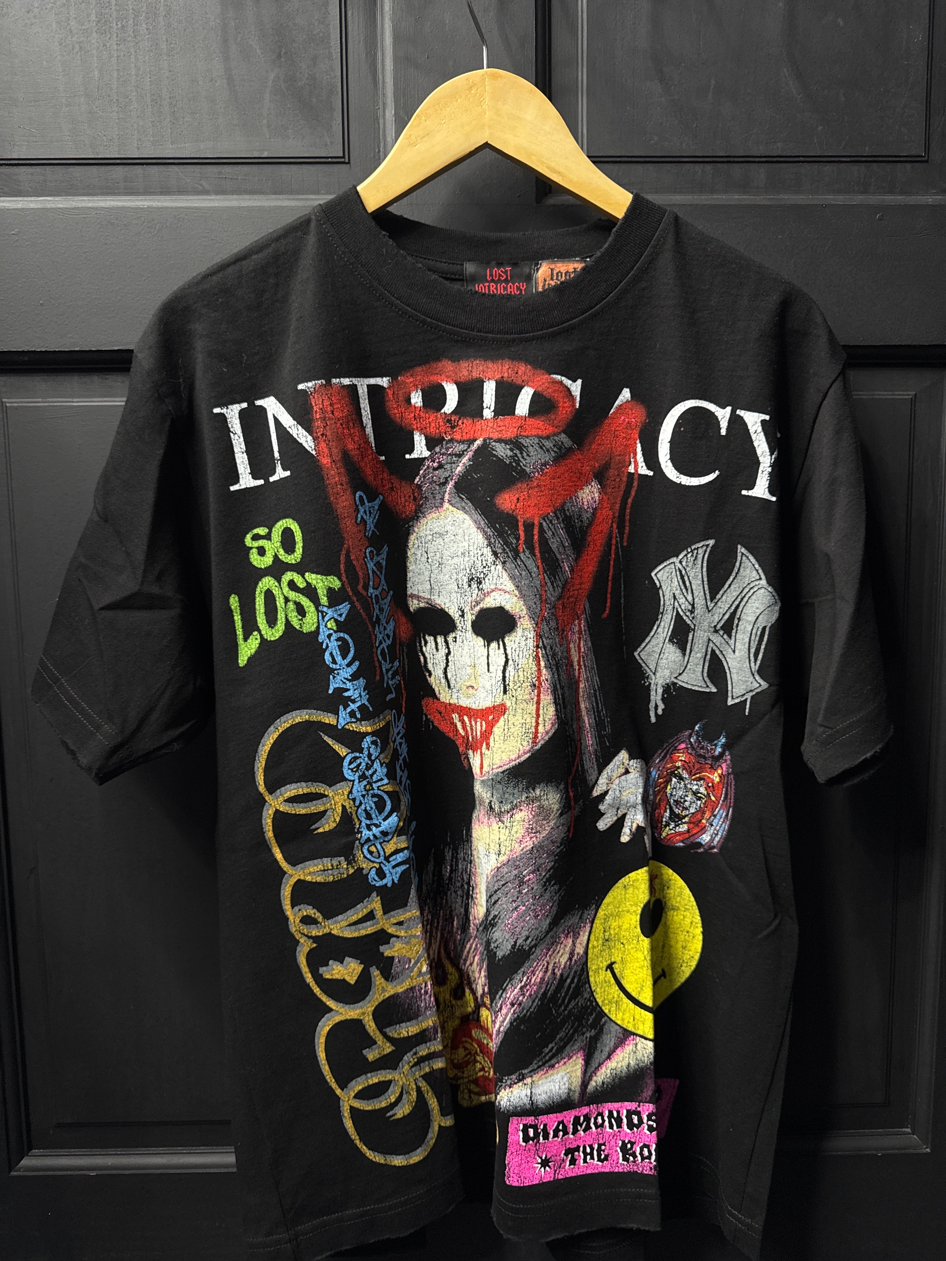 Lost intricacy black front mag tee sz Medium