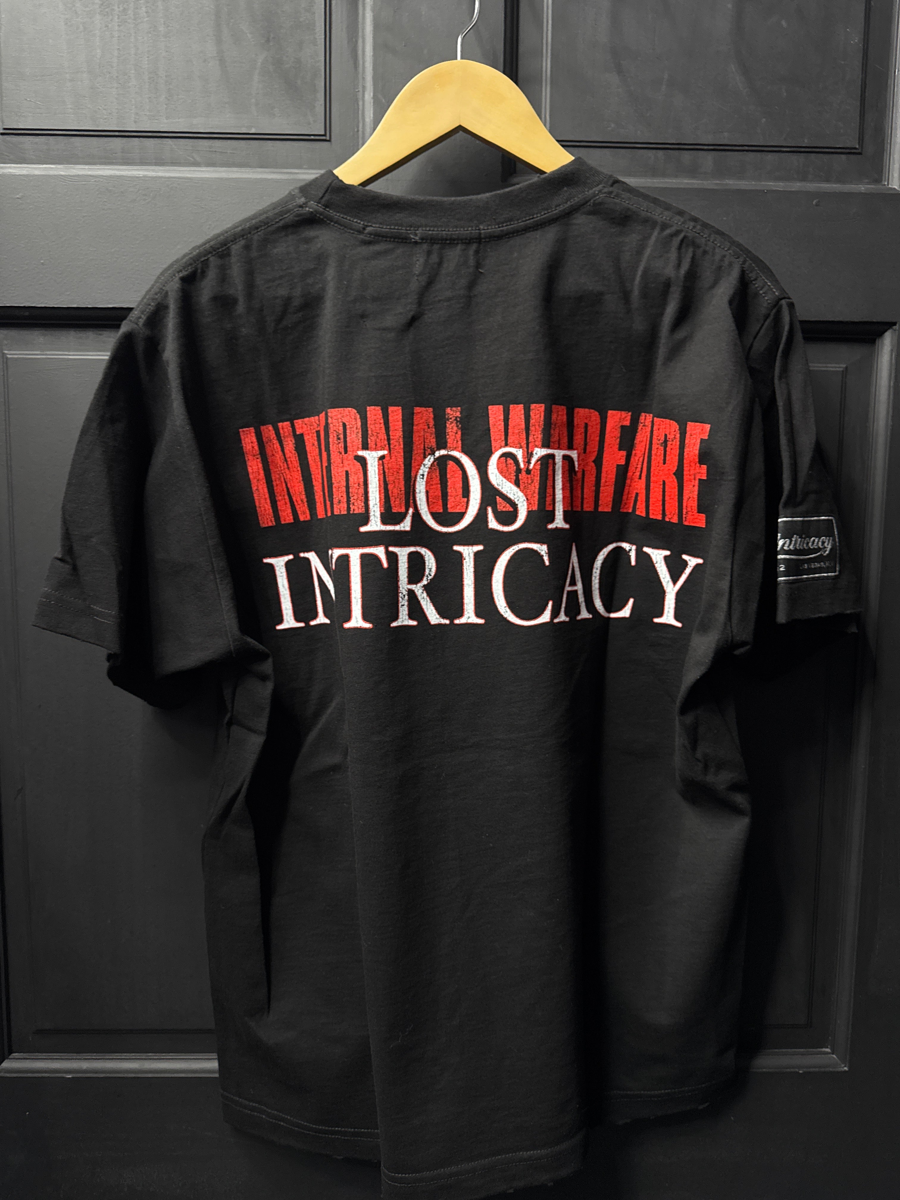 Lost intricacy black front mag tee sz Medium