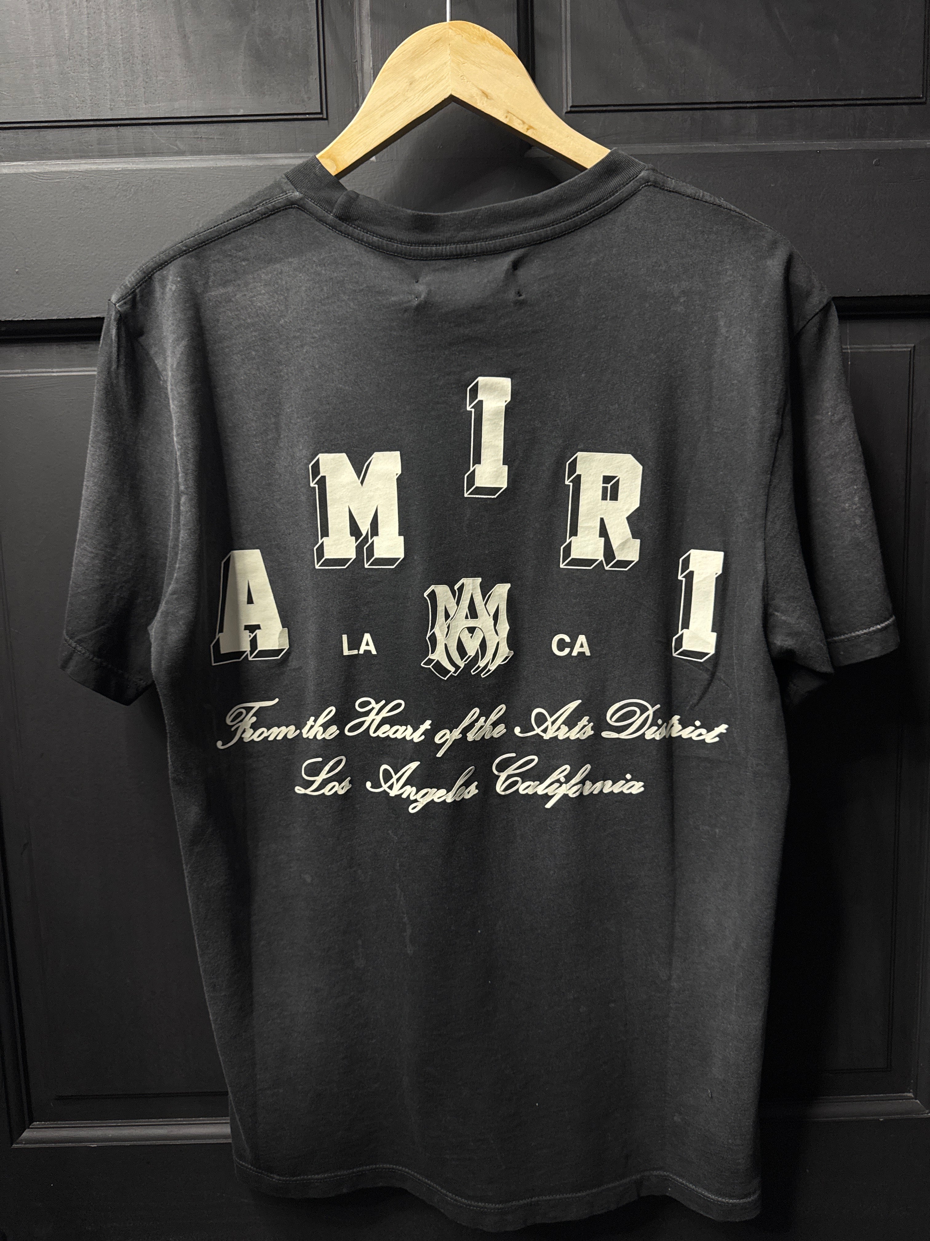Amiri collegiate logo tee